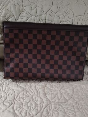 Woman's Brown Checkered Leather Clutch - Sleek Travel Pouch